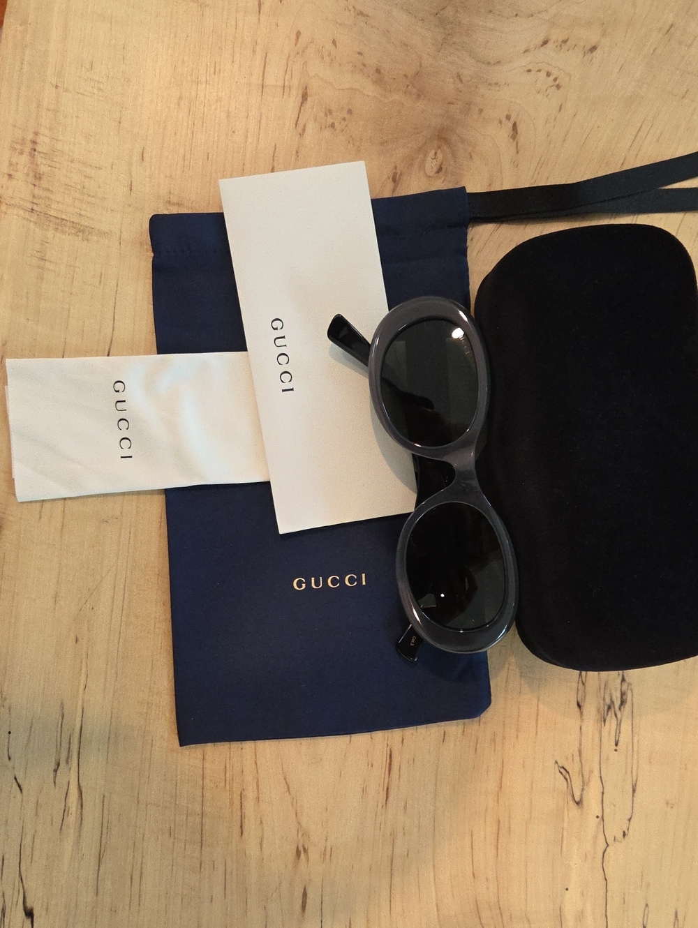 Gucci GG1587S 001 Black Oval Sunglasses with Dark Lenses